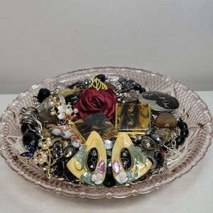 Pink Depression Glass Filled With Jewelry